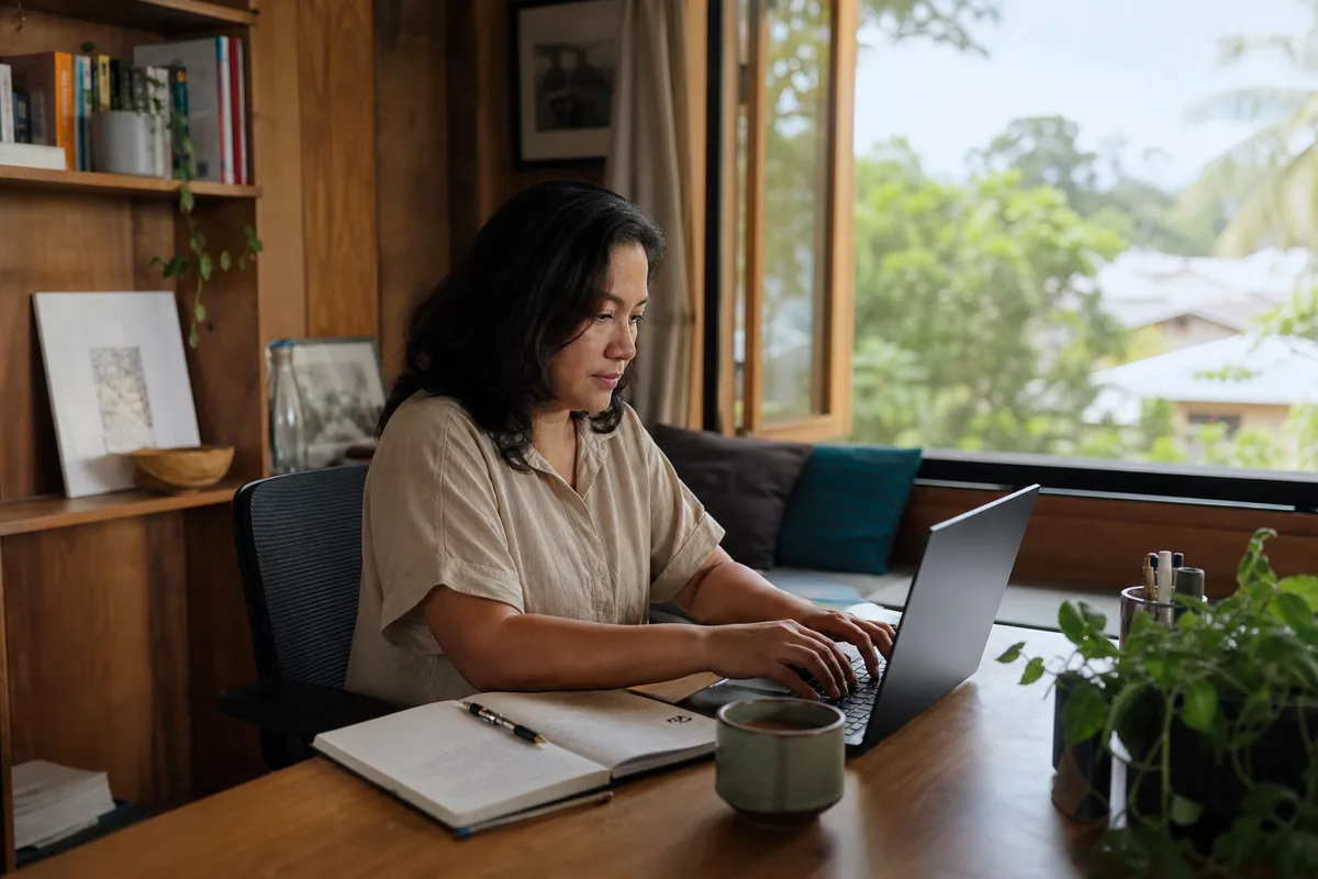 Malaysian professional working from a home office in Sarawak